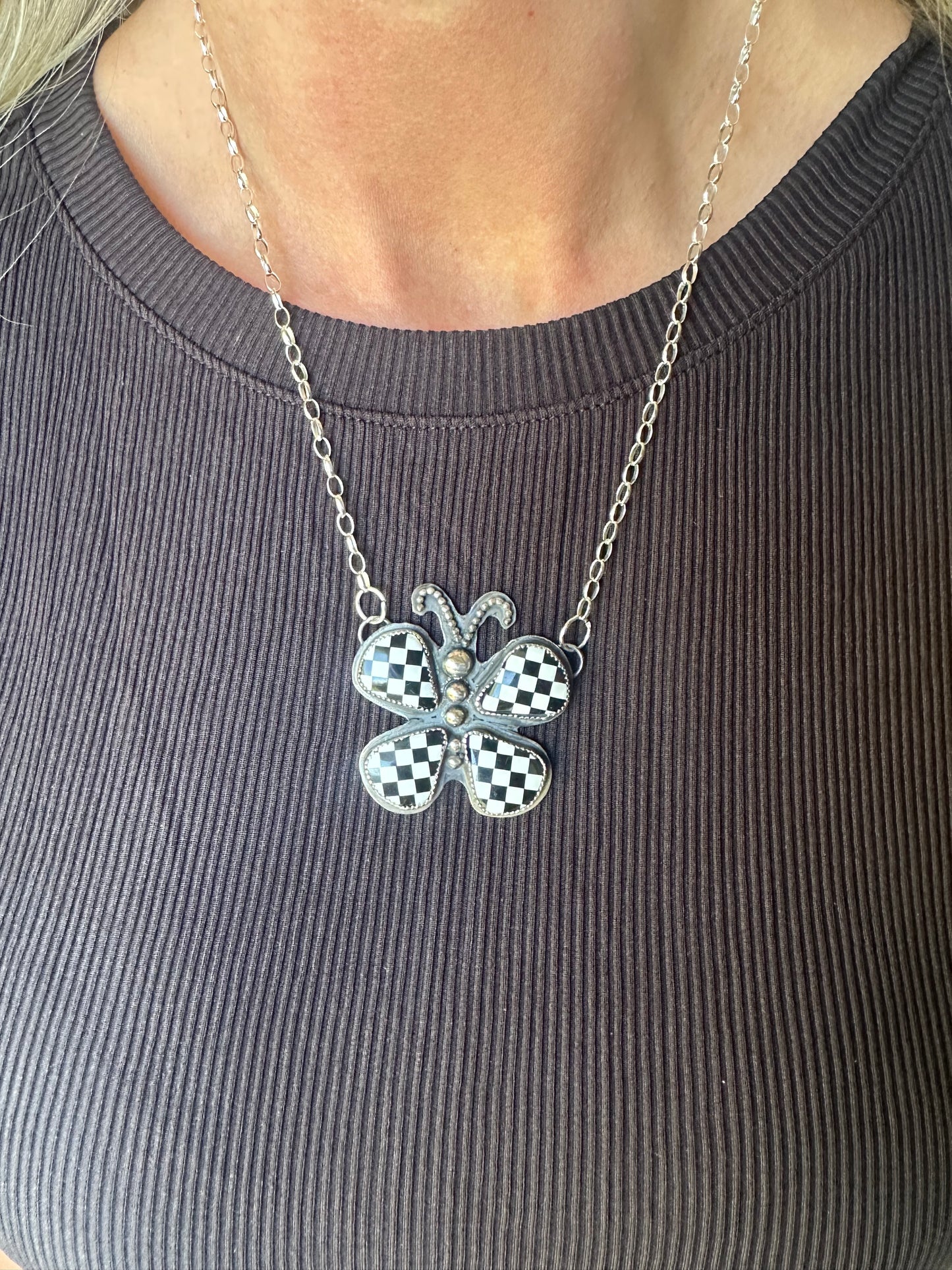 Checkered butterfly necklace