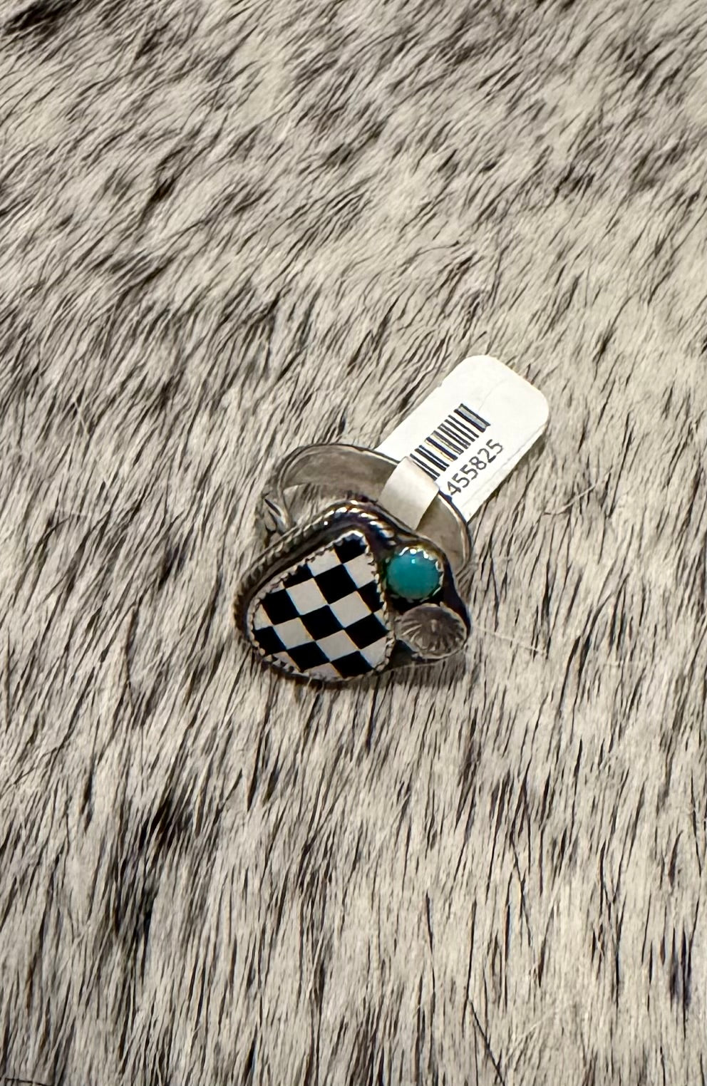 Kingman and black and white checkered ring